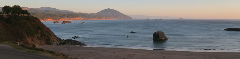 <p>Humbug Mountain and Red Fish Rocks from Port Orford</p>