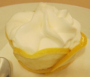 <p>Lemon sorbet in a cup made of lemon slices</p>
