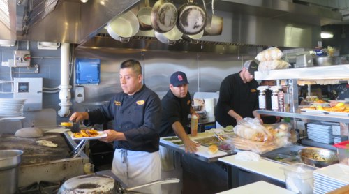 <p>Enrique Sanchez and his crew hard at working pushing out magnificent plates</p>